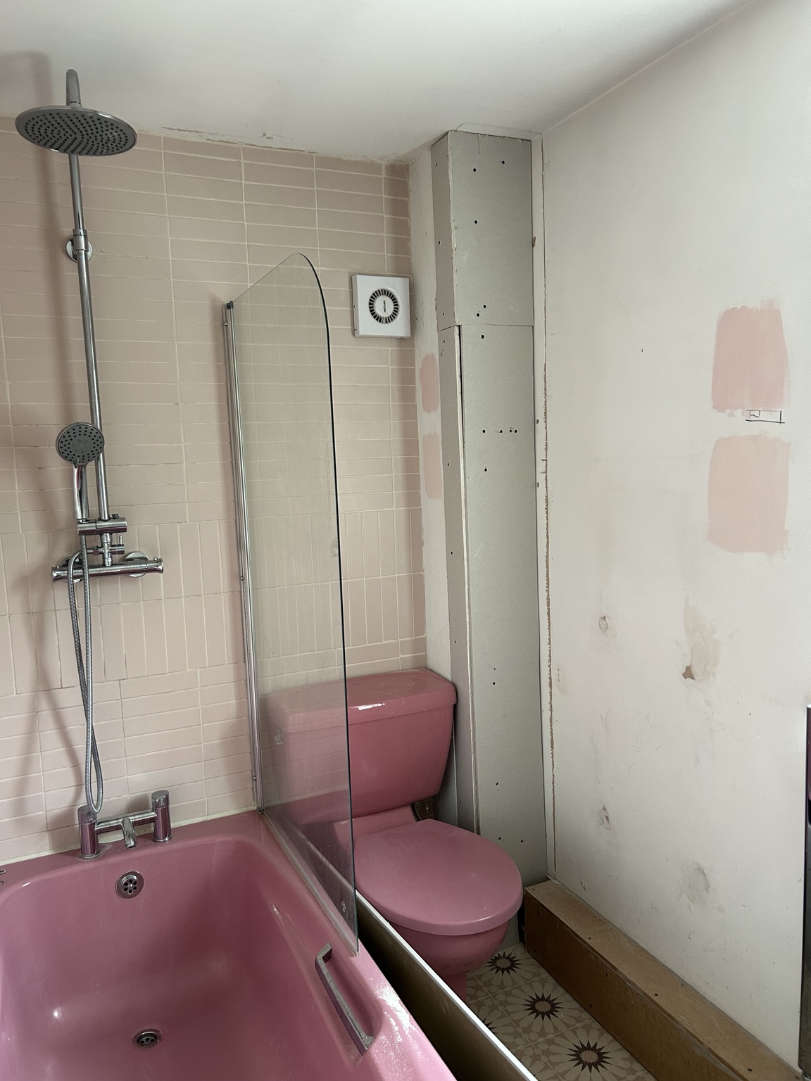 As we found it: unfinished boxing, bare plaster and paint samples